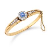 ANTIQUE SAPPHIRE AND DIAMOND BANGLE set with a cushion cut sapphire of approximately 1.90 carats and