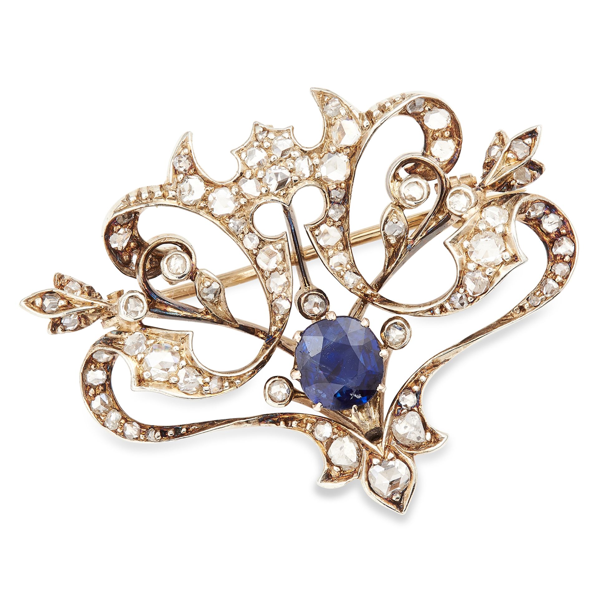 ANTIQUE SAPPHIRE AND DIAMOND BROOCH set with a cushion cut sapphire in an open framework set with