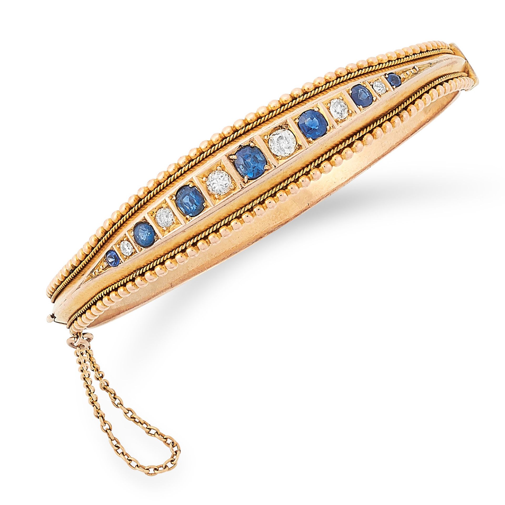 ANTIQUE SAPPHIRE AND DIAMOND BANGLE set with alternating round cut sapphires and old cut diamonds,