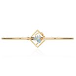 AQUAMARINE BAR BROOCH set with three round cut aquamarines, 5.1cm, 1.9g.