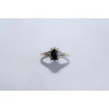 A 9 CARAT GOLD, SAPPHIRE AND DIAMOND CLUSTER RING