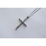 A PLATINUM AND DIAMOND PENDANT