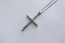 A PLATINUM AND DIAMOND PENDANT