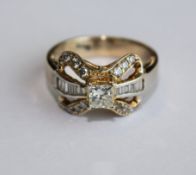 A YELLOW GOLD AND DIAMOND RING