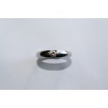 A SINGLE STONE DIAMOND AND 9CT WHITE GOLD RING