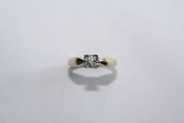 A DIAMOND AND YELLOW GOLD RING