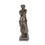 AFTER THE ANTIQUE, THE VENUS DE MILO, A PATINATED BRONZE FIGURE