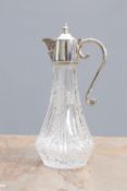 A SILVER-PLATE MOULDED GLASS CLARET JUG