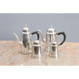 A FOUR PIECE SILVER PLATED TEA AND COFFEE SERVICE IN EARLY 18th CENTURY STYLE