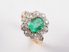 A COLOMBIAN EMERALD AND DIAMOND RING
