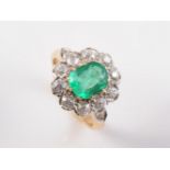 A COLOMBIAN EMERALD AND DIAMOND RING