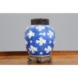 A CHINESE BLUE AND WHITE PRUNUS VASE