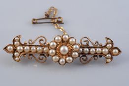 A LATE 19TH CENTURY PEARL SET BROOCH