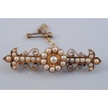 A LATE 19TH CENTURY PEARL SET BROOCH