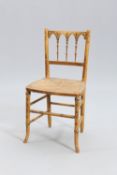 A REGENCY PAINTED FAUX BAMBOO SIDE CHAIR