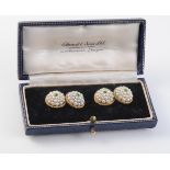 A PAIR OF LATE 19TH CENTURY DEMANTOID GARNET AND SEED PEARL CUFFLINKS