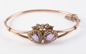 AN AMETHYST AND SEED PEARL BANGLE