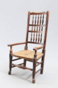 AN EARLY 19TH CENTURY LANCASHIRE ELM SPINDLE BACK OPEN ARMCHAIR