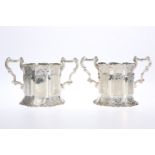 A PAIR OF MID-VICTORIAN SILVER AND SILVER-GILT TALL BOTTLE COASTERS, SAMUEL HAYNE & DUDLEY CATER, LO