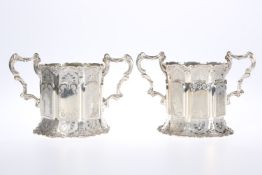 A PAIR OF MID-VICTORIAN SILVER AND SILVER-GILT TALL BOTTLE COASTERS, SAMUEL HAYNE & DUDLEY CATER, LO