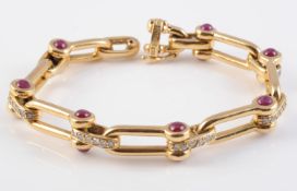 AN 18CT YELLOW GOLD, RUBY AND DIAMOND BRACELET BY VOURAKIS