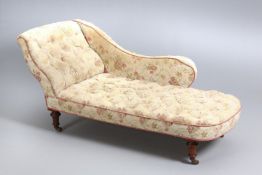 A VICTORIAN MAHOGANY AND DEEP BUTTONED UPHOLSTERED CHAISE LONGUE