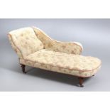 A VICTORIAN MAHOGANY AND DEEP BUTTONED UPHOLSTERED CHAISE LONGUE