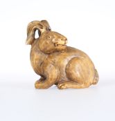 A JAPANESE IVORY NETSUKE OF A HARE