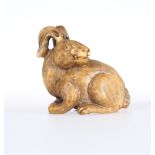 A JAPANESE IVORY NETSUKE OF A HARE