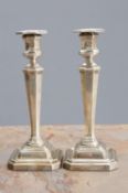 A PAIR OF GEORGE V SILVER CANDLESTICKS