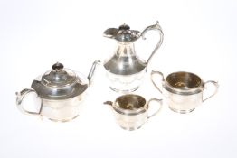 A LATE VICTORIAN SILVER-PLATED FOUR PIECE TEA AND COFFEE SERVICE