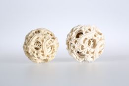 TWO 19TH CENTURY CHINESE IVORY PUZZLE BALLS