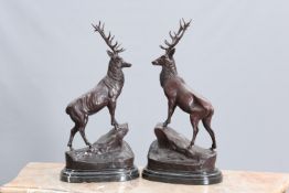A LARGE PAIR OF BRONZE STAGS