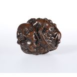 A JAPANESE CARVED WOODEN BALL