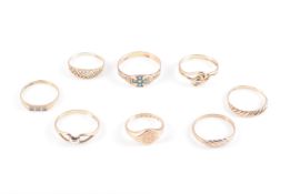 A GROUP OF EIGHT GOLD RINGS