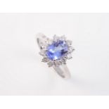 AN 18CT WHITE GOLD, TANZANITE AND DIAMOND RING