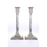 A PAIR OF VICTORIAN SILVER CLUSTER COLUMN CANDLEST