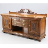 A LARGE VICTORIAN CARVED OAK SIDEBOARD, CIRCA 1870