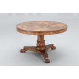 A REGENCY ROSEWOOD BREAKFAST TABLE