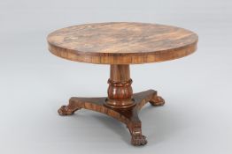 A REGENCY ROSEWOOD BREAKFAST TABLE