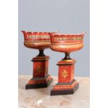 A PAIR OF TOLEWARE URNS OR TAZZAS IN THE REGENCY TASTE