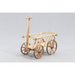 A VICTORIAN PAINTED PINE DOG CART