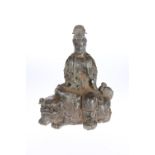 A CHINESE BRONZE OF GUANYIN