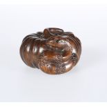 A JAPANESE CARVED WOODEN NETSUKE