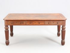 A WILLIAM IV MAHOGANY PARTNERS WRITING DESK