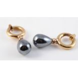 A PAIR OF 18CT YELLOW GOLD AND HEMATITE EARRINGS BY DEAKIN AND FRANCIS