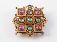 A LATE 19TH CENTURY RUBY AND EMERALD SET BROOCH IN THE MANNER OF CASTELLANI