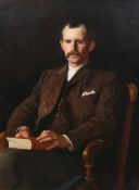 PORTRAIT OF A GENTLEMAN SEATED IN A CHAIR HOLDING A BOOK