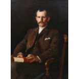 PORTRAIT OF A GENTLEMAN SEATED IN A CHAIR HOLDING A BOOK