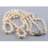 A CULTURED PEARL AND DIAMOND NECKLACE